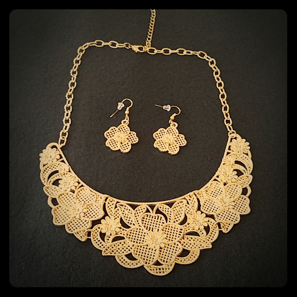 Gold flower collar necklace and matching earrings
